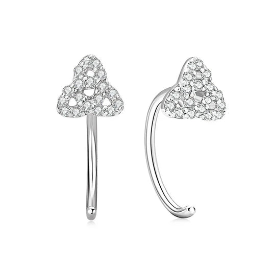 Silver nose rings with trinity knot design and clear crystal accents on white background