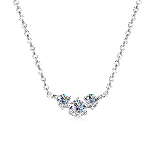 Elegant sterling silver necklace with three round brilliant cut diamonds on a fine chain