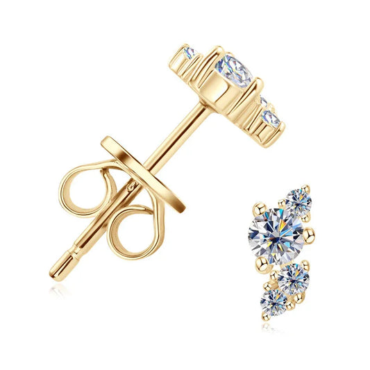 Gold stud earring with three round cubic zirconia stones set in a cluster design